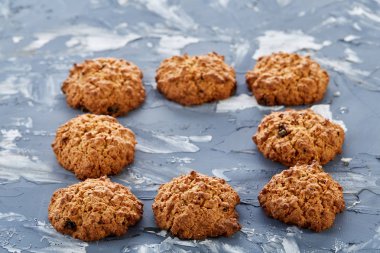 Tatlı kurabiye hafif dokulu arka plan, yakın çekim, sığ alan, seçici odak derinliği desen düzenlenmiş.