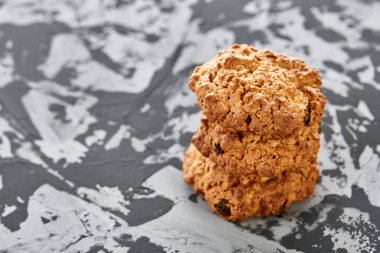 Tatlı kurabiye hafif dokulu arka plan, yakın çekim, sığ alan, seçici odak derinliği desen düzenlenmiş.