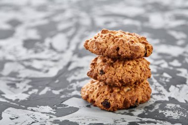 Tatlı kurabiye hafif dokulu arka plan, yakın çekim, sığ alan, seçici odak derinliği desen düzenlenmiş.