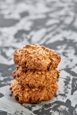 Tatlı kurabiye hafif dokulu arka plan, yakın çekim, sığ alan, seçici odak derinliği desen düzenlenmiş.