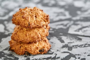 Tatlı kurabiye hafif dokulu arka plan, yakın çekim, sığ alan, seçici odak derinliği desen düzenlenmiş.