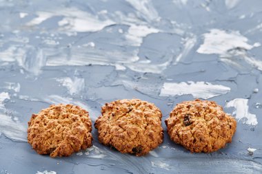 Tatlı kurabiye hafif dokulu arka plan, yakın çekim, sığ alan, seçici odak derinliği desen düzenlenmiş.