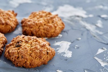 Tatlı kurabiye hafif dokulu arka plan, yakın çekim, sığ alan, seçici odak derinliği desen düzenlenmiş.