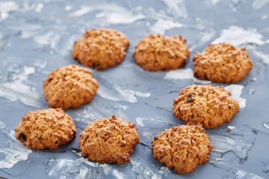 Tatlı kurabiye hafif dokulu arka plan, yakın çekim, sığ alan, seçici odak derinliği desen düzenlenmiş.