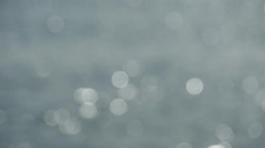 Tatil bulanık soyut hareket arka plan, bokeh. Gri renkli defocused bokeh daireler bulanıklık. 