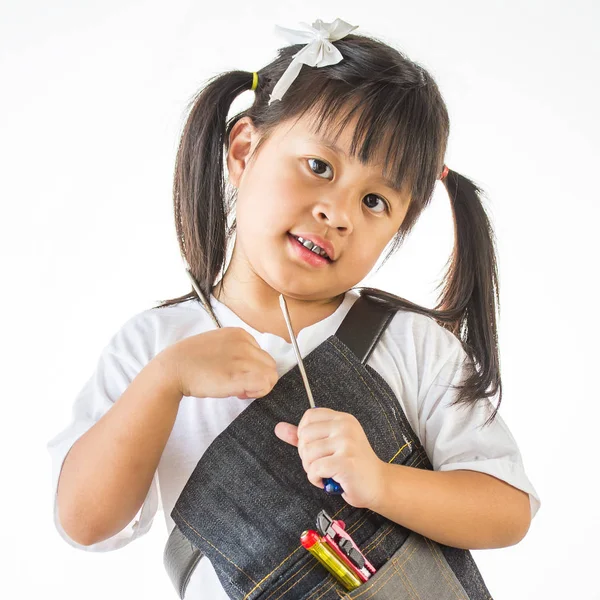 Little girl hold maintenance equipment on white — Stock Photo, Image