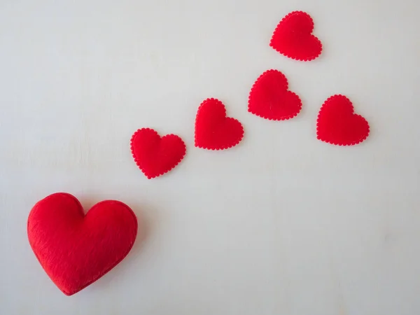 Red hearts on wood — Stock Photo, Image