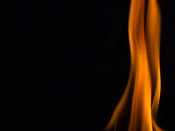 Fire flames on black background — Stock Photo, Image