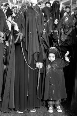 Turkish Shia women takes part in an Ashura parade  clipart