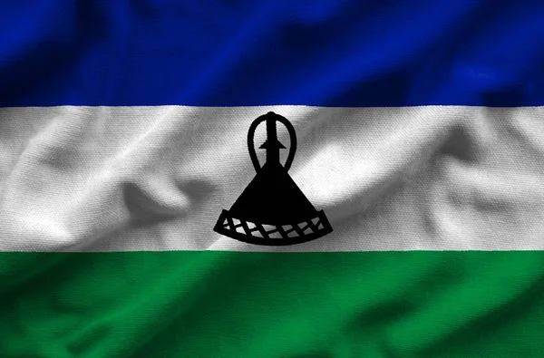 Lesotho zászlaja. Jelző van egy részletes reális szövet szerkezete. — Stock Fotó