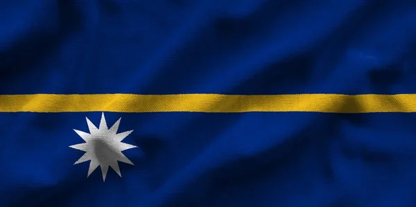 Nauru zászlaja. Jelző van egy részletes reális szövet szerkezete. — Stock Fotó