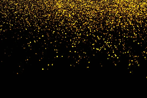 Abstrakcyjny złoty rozproszony brokat tło wakacje na czarny. Spadające błyszczące błyszczące. Nowy rok Boże Narodzenie świeci tło — Zdjęcie stockowe