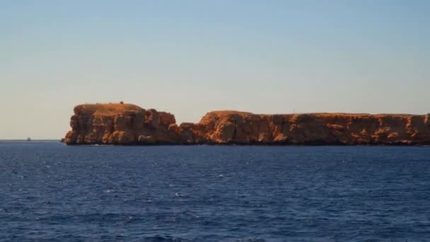 The rocky sea shore. View from ship — Stock Video