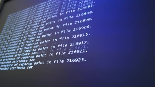 Programming code running down a computer screen terminal — Stock Video