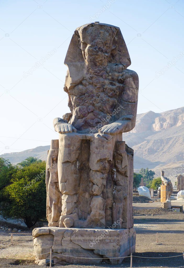 Luxor, Egypt. The Colossus of Memnon. Massive stone statue of the Pharaoh Amenhotep III