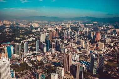 Modern mimarisi, iş ofis binası, cityscape arka plan. Kuala Lumpur manzarası. Malezya için seyahat. Kentsel gökdelenler. Modern şehir. Finans bölgesine. Şehrin havadan görünümü. Lüks otel