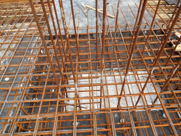 Hot rolled deformed steel bars or steel reinforcement bar at construction site.