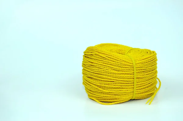A roll of yellow nylon rope — Stock Photo, Image