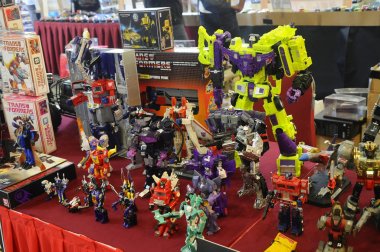 KUALA LUMPUR, MALAYSIA -MARCH 18, 2017: Transformers television cartoon and film action figure display on the table. clipart