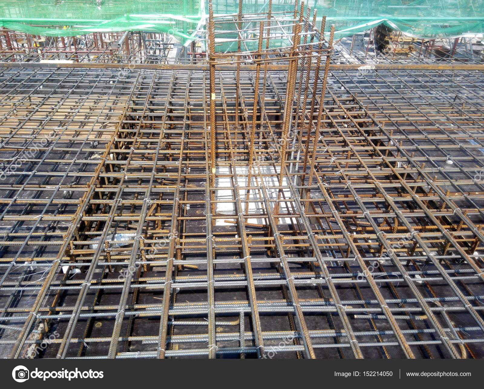 Steel reinforcement bar at construction site. Stock Photo by ©Aisyaqilumar 152214050