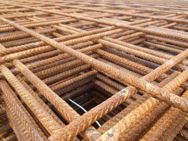 Kuala Lumpur, Malezya-18 Ocak 2017: çelik takviye çubuğu inşaat sahasında. Bu beton güçlendirmek için kullanılır. Şeklinde olduğunu mühendislik tasarımı izleyin ve birlikte küçük tel kullanarak bağlı. 