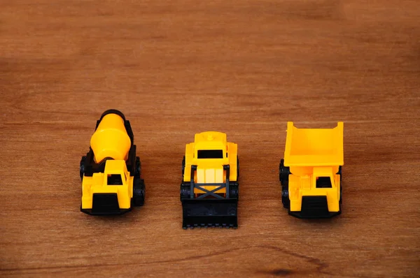 Gruppe Von Kleinen Schweren Baumaschinen Spielzeug Lkw Planierraupe Und Betonmischer — Stockfoto