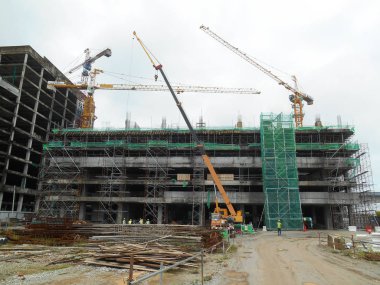 Seremban, Malezya-25 Şubat 2017: şantiye gündüz sırasında Seremban, Malezya sürüyor. Günlük aktivite devam ediyor. 