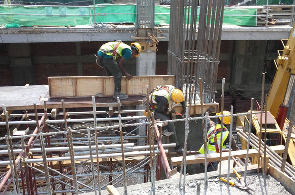 KUALA LUMPUR, MALAYSIA -SEPTEMBER 5, 2016: Timber formwork commonly made from plywood and timber at the construction site. Formwork used as the mold for the reinforcement concrete. 