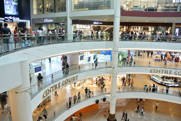 KUALA LUMPUR, MALAYSIA -JUNE 01, 2018: Huge shopping mall main atrium. Business & other activities are held in this area and many visitors are on weekends.