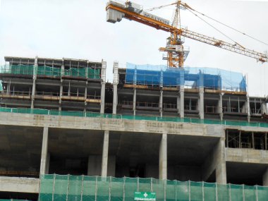 Kuala Lumpur, Malezya - 28 Haziran 2018: Yüksek katlı apartman veya inşaat halindeki daire. Modern cephe tasarımıyla tanıtılan tasarım. Yüksek katlı apartman Malezya 'nın kentsel bölgesinde popülerdi. 