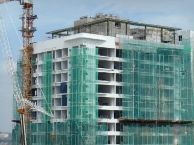 Kuala Lumpur, Malezya - 28 Haziran 2018: Yüksek katlı apartman veya inşaat halindeki daire. Modern cephe tasarımıyla tanıtılan tasarım. Yüksek katlı apartman Malezya 'nın kentsel bölgesinde popülerdi. 