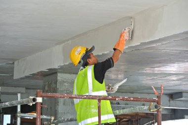 Selangor, Malezya-03 Eylül 2016: Site çalışanları recessed yağsız kat işini inşaat sahasında yapıyorsunuz. 