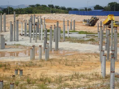 Drove to level bore pile at the construction site. Ready to cut and next stage of foundation work.  