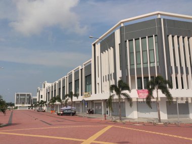KUALA LUMPUR, MALAYSIA - AUGUST 04, 2019: Multy-story terrace shop lots facade at the commercial area. The shop lot facade designed with beautiful design to attract buyer and customer.  