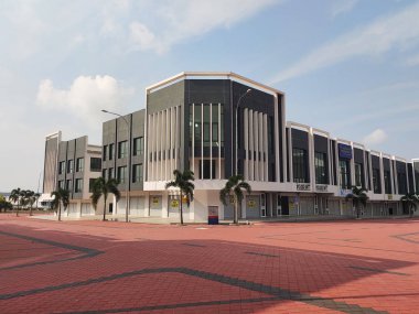 KUALA LUMPUR, MALAYSIA - AUGUST 04, 2019: Multy-story terrace shop lots facade at the commercial area. The shop lot facade designed with beautiful design to attract buyer and customer.  