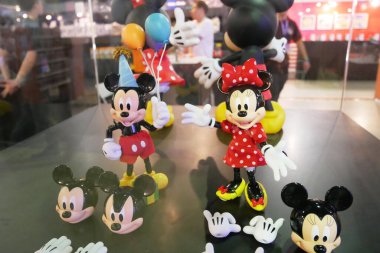 KUALA LUMPUR, MALAYSIA -JUNE 7, 2018: Fictional cartoon characters from Disney called Mickey & Minnie Mouse. Collector item of Mickey Mouse action figure display on a table. 