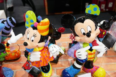 KUALA LUMPUR, MALAYSIA -JUNE 7, 2018: Fictional cartoon characters from Disney called Mickey & Minnie Mouse. Collector item of Mickey Mouse action figure display on a table. 