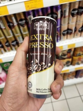 KUALA LUMPUR, MALAYSIA -MARCH 11, 2019: Coffee drinks in many flavours in aluminium cans. It comes in many brands. Some are mixed with cream as a seasoning. On display for sale on supermarket shelves.