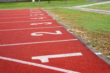 KUALA LUMPUR, MALAYSIA -APRIL 27, 2019: Outdoor running track or athlete track. Orange brick color.  