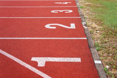 KUALA LUMPUR, MALAYSIA -APRIL 27, 2019: Outdoor running track or athlete track. Orange brick color.  