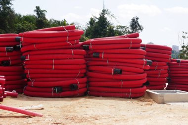 KUALA LUMPUR, MALAYSIA -FEBRUARY 6, 2019: HDPE corrugated pipe with double-wall strength at the construction site. Used to protect underground cable. 