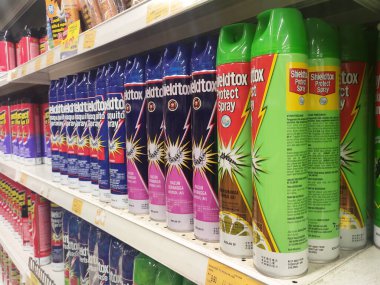 KUALA LUMPUR, MALAYSIA -MARCH 3, 2020: Selective focused of insecticides in cans and displayed on shelves for sale in the supermarket. Separated by the brand to facilitate buyers.