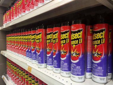 KUALA LUMPUR, MALAYSIA -MARCH 3, 2020: Selective focused of insecticides in cans and displayed on shelves for sale in the supermarket. Separated by the brand to facilitate buyers.