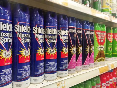 KUALA LUMPUR, MALAYSIA -MARCH 3, 2020: Selective focused of insecticides in cans and displayed on shelves for sale in the supermarket. Separated by the brand to facilitate buyers.