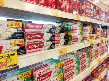 KUALA LUMPUR, MALAYSIA -DECEMBER 09, 2019: The toothpaste is in the box and is displayed on the shelf sorted by brand and type. This makes it easy for buyers to choose from.