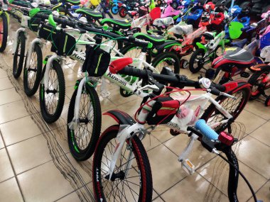 NILAI, MALAYSIA -MARCH 5, 2020: Various types of bikes are on display in the store. Kids bike to an adult bike.