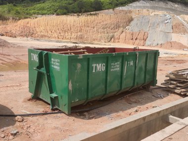 KUALA LUMPUR, MALAYSIA -MARCH 3, 2020: Huge wasted disposal bin used to collect rubbish and unused material from the construction site. Has a fixed collection schedule