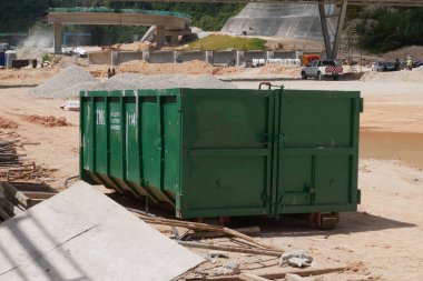 KUALA LUMPUR, MALAYSIA -MARCH 3, 2020: Huge wasted disposal bin used to collect rubbish and unused material from the construction site. Has a fixed collection schedule