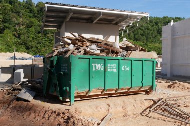 KUALA LUMPUR, MALAYSIA -MARCH 3, 2020: Huge wasted disposal bin used to collect rubbish and unused material from the construction site. Has a fixed collection schedule