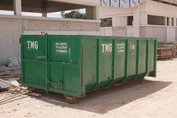 KUALA LUMPUR, MALAYSIA -MARCH 3, 2020: Huge wasted disposal bin used to collect rubbish and unused material from the construction site. Has a fixed collection schedule